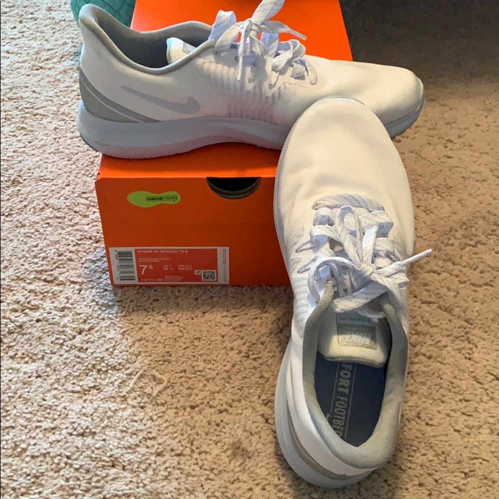 White Nike tennis shoes